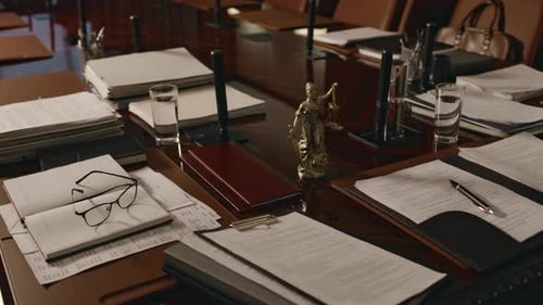 Table at Conference Hall with Lots of Documents at Legal Firm
