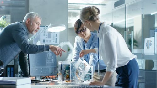 Team of Computer Engineers Choose Printed Circuit Boards to Work with, Computer Shows Programming i