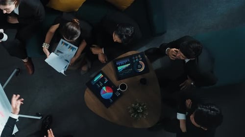 Top down view of business people listen businessman present idea. Directorate.