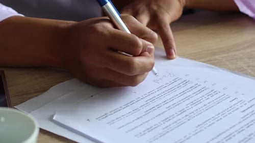 Woman Signing Official Business Document Close Up