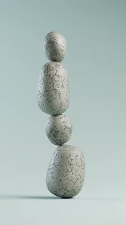 Vertical stack of stones balancing perfectly.
