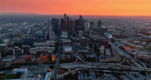 Vast view of Los Angeles, California, US at twilight. Skyscrapers in the downtown in the center