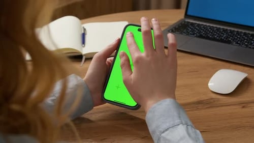 Girl Swipe Turn on Cell Phone Tap Top Green Screen Display at Office Workplace