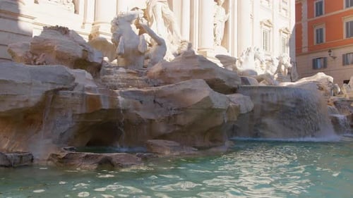 Sun Reflections on the Water of Trevi Fountain