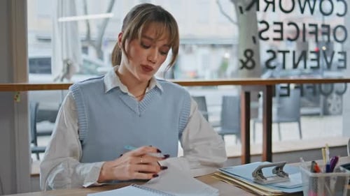 Girl Student Making Notes in Notebook Sitting Cafe Alone Closeup Woman Writing