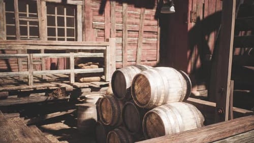 Old Wooden Barrels Stacked Outside Rustic Building