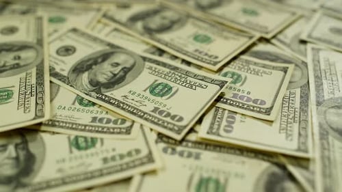 Pile of US Currency One Hundred Dollar Bills