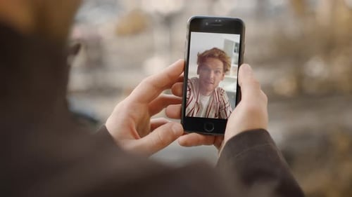 Man having a Video Call on his Phone