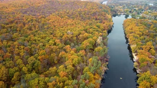 Autumn aerial above river with yellow riverbanks