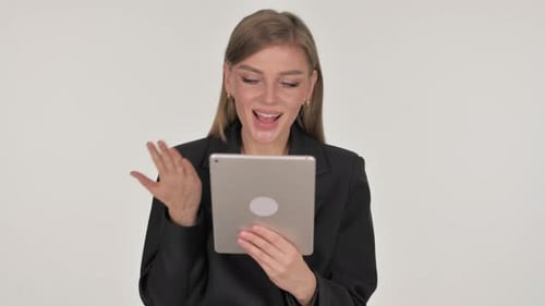 Woman Waving During Tablet Video Conference
