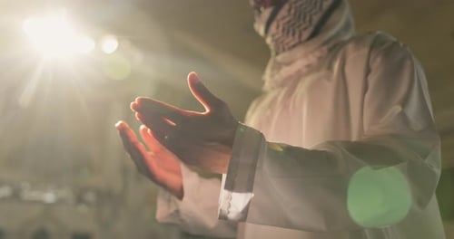 Praying, Islamic or person with open hands in mosque for spiritual reading