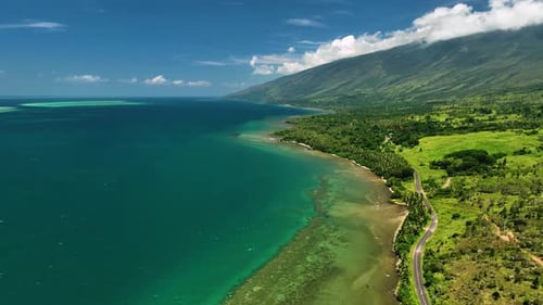 Aerial view of tropical coastline and mountains, New Caledonia.