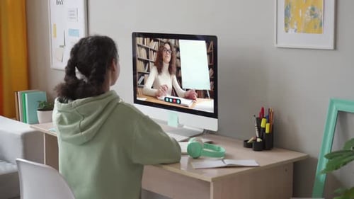 Teen Girl Attends Online Lesson at Home
