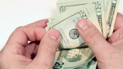 counting money, dollar money. counting cash