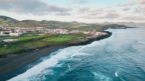 Desert Black Sand Volcanic Beach with Crashing Foam Waves Atlantic Ocean