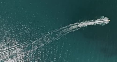Sea waves created by a jet ski at Baltic Sea.