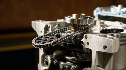 Close Up The Crankshaft Set of Pistons Closeup on Desktop of an Auto Mechanic Spare Parts of the Car