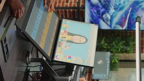 Digital Artist Editing Photos in Creative Workspace