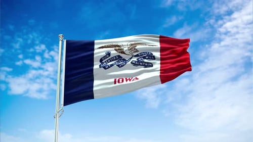 Waving Iowa State Flag on a Pole with Blue Sky Background