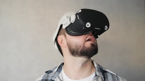 Man Experiencing Virtual Reality with VR Headset