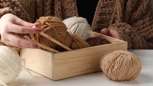 Yarn Balls in Wooden Box with Knitting Needles