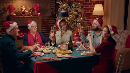 Family Toasting at Christmas Dinner Celebration