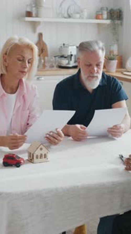 Black Woman Real Estate Manager Meeting with Elderly Couple in New House African American Woman