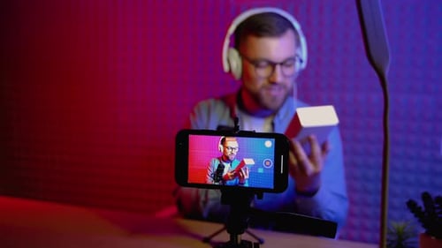 Man Recording Technology Review on Smartphone