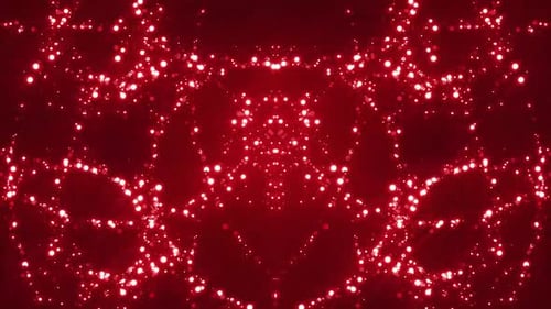 Des particules rougeoyantes vibrantes dansent et scintillent magnifiquement