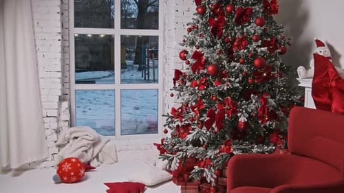 Festive Christmas Tree with Red Decorations in Winter Home