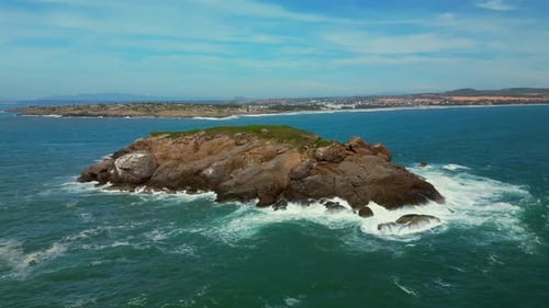 Aerial Top View of Waves Crashing on Rocks in a Blue Ocean Sea Waves on a Beautiful Beach Aerial