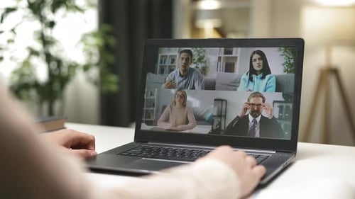 Virtual Team Meeting Video Call on Laptop