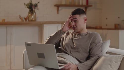 A Young Freelancer's Laptop Stopped Working While Working A Freelancer is Having Trouble Working