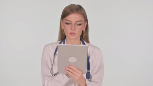 Woman Doctor Using a Tablet in a Hospital