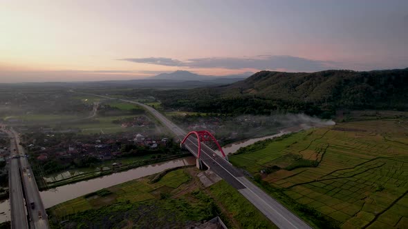 Aerial view of the Kalikuto Bridge, an Iconic Red Bridge at Trans Java ...