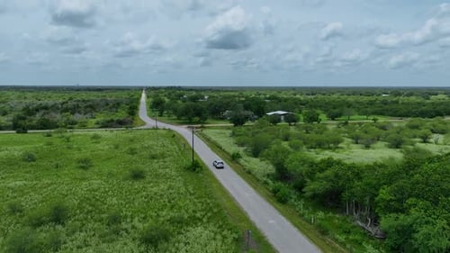 car driving on a country road