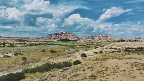 Rocky Valley Under A Blue Sky