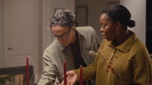 Friends Prepare Festive Table for Holiday Dinner Party