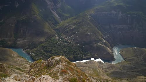 Majestic Mountain Landscape View Breathtaking Valley Surrounded By Rugged Cliffs And Flowing Stream