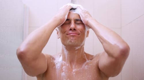 Man Washing Hair in the Shower