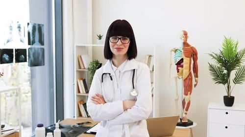 Confident Female Doctor in Modern Medical Office
