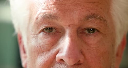 Extreme Close Up of Smiling Older Person's Face