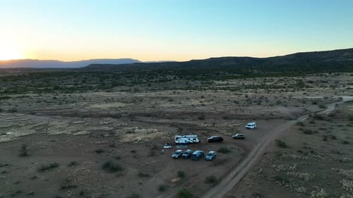 Deserted Landscape With Camper Van And Vehicles In Sedona, Arizona - Aerial Pullback