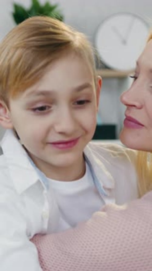 Mother and Son Affectionate Hug and Kiss Vertical Video