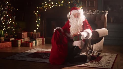 Santa Claus Taking Present Out of Gift Bag
