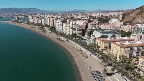 Malaga aerial coastline with beach and city buildings