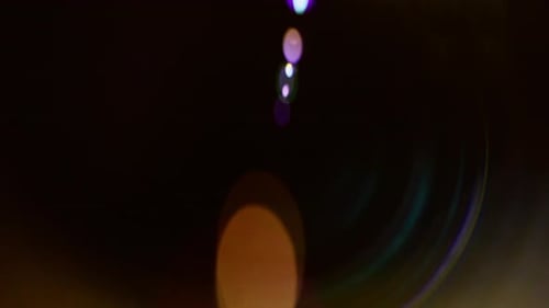 Captivating Lens Flares On Dark Background