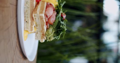 Close Up of Waffle Sandwich with Egg and Cheese