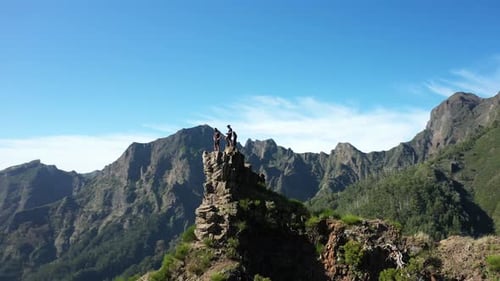 Aerial View of People on Mountain Peak