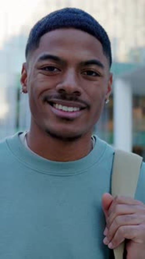 Portrait of Young African American Student Man Smile at Camera at College Campus